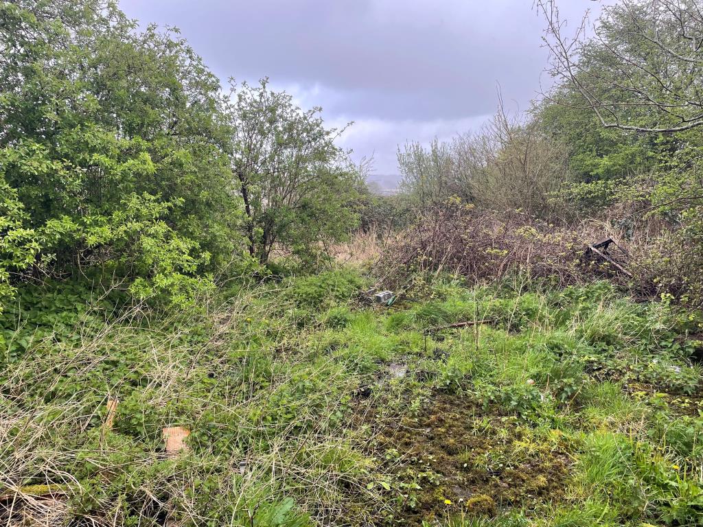 Lot: 18 - 13 PARCELS OF LAND WITH POTENTIAL IN STRATEGIC LOCATION - view of land towards Marshfoot Lanre from building